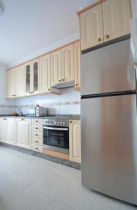 Η κουζίνα ή μικρή κουζίνα στο Apartamento As Carolinas