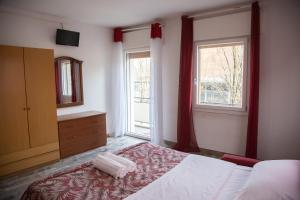 Posteľ alebo postele v izbe v ubytovaní Venice Holiday