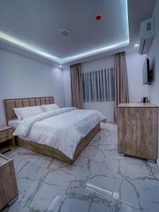 Petra Caravan Guest House tesisinde bir odada yatak veya yataklar