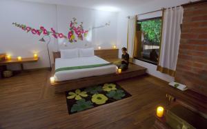 Voodi või voodid majutusasutuse Thanakha Inle Hotel toas