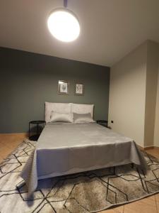 Postel nebo postele na pokoji v ubytování Oda Hotel Tirana