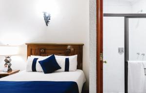 Postel nebo postele na pokoji v ubytování CASA MAYES