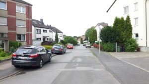a street with cars parked on the side of the road at gemütliches Appartament 30 m2 in Unna in Unna
