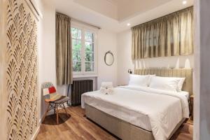 Ένα ή περισσότερα κρεβάτια σε δωμάτιο στο Couple-in magical suite with jacuzzi
