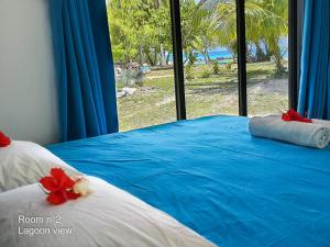 Postel nebo postele na pokoji v ubytování Blue Lagoon Villa