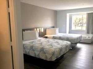 Postel nebo postele na pokoji v ubytování Motel 6-McAllen, TX - East