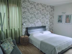 Posteľ alebo postele v izbe v ubytovaní Ai Ronchi B&B + 37 fotografií