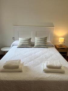 Postel nebo postele na pokoji v ubytování Casa Blanca