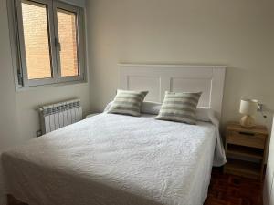 Postel nebo postele na pokoji v ubytování Casa Blanca + 14 fotografií