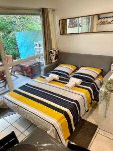 Posteľ alebo postele v izbe v ubytovaní Studio Rénové au calme avec Terrasse Trouville