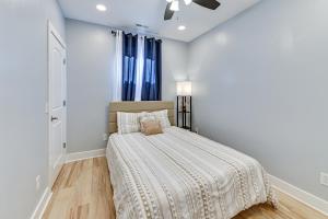 a bedroom with a bed and a window at Pet-Friendly New Albany Home Less Than 7 Mi to Louisville! in New Albany