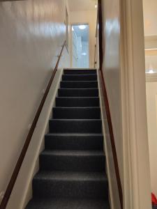 a flight of stairs in a building at Garden of peace in Erith