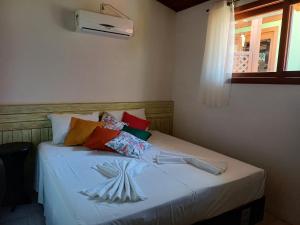 Giường trong phòng chung tại Vila Figueiredo das Donas +160 ảnh