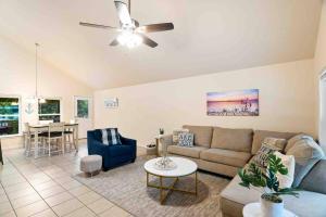 a living room with a couch and a table at The Lake House in Canyon Lake