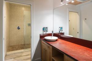 a bathroom with a sink and a shower at Gravity Haus Truckee-Tahoe in Truckee +42 photos