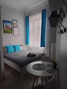 Posteľ alebo postele v izbe v ubytovaní Discover Cracow APARThostel