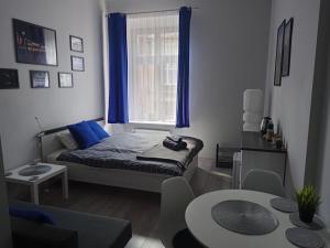 Posteľ alebo postele v izbe v ubytovaní Discover Cracow APARThostel