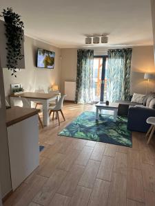 Posedenie v ubytovaní Domki Złote Piaski Kryty Basen Sauna Jacuzzi
