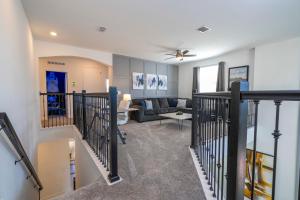 Et tv og/eller underholdning på Stunning 5Bd w Pool Close to Disney at Champions Gate 8956