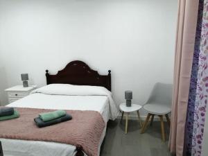 Katil atau katil-katil dalam bilik di Casa do Roberto