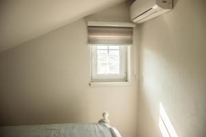 Postel nebo postele na pokoji v ubytování Apartments Bašić