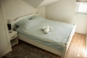 Postel nebo postele na pokoji v ubytování Apartments Bašić