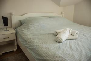 Postel nebo postele na pokoji v ubytování Apartments Bašić
