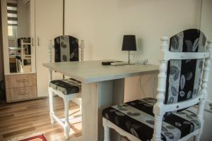 Kuchyň nebo kuchyňský kout v ubytování Apartments Bašić