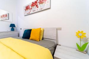 Postel nebo postele na pokoji v ubytování Casa di Jennifer 3