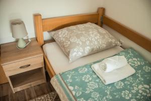 Postel nebo postele na pokoji v ubytování Apartments Bašić