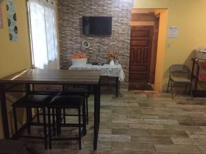 TV a/nebo společenská místnost v ubytování La Cabaña de Bella