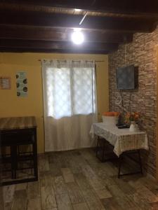 TV a/nebo společenská místnost v ubytování La Cabaña de Bella