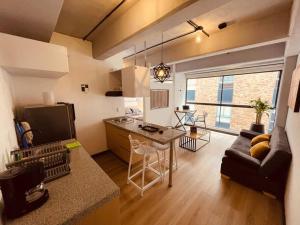 Istumisnurk majutusasutuses APTOPOR606 - Encantador apartamento tipo loft - Chapinero - Wifi - TV