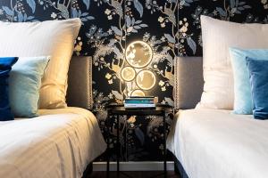 Ein Bett oder Betten in einem Zimmer der Unterkunft Design Altstadtperle mit 2,5 Schlafzimmer- Waschmaschine - Parkplatz