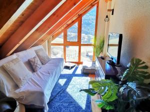 Posezení v ubytování Dúplex con terraza y vistas panorámicas en Taüll