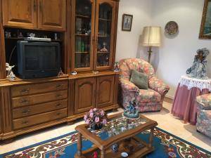Χώρος καθιστικού στο CASA DEL PALMERAL EN ORTIGUEIRA