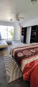 Ένα ή περισσότερα κρεβάτια σε δωμάτιο στο Alma de Gracia