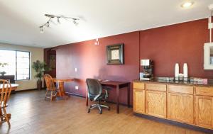 a living room with a kitchen and a dining room at Red Roof Inn Lompoc in Lompoc