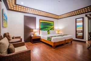 Кровать или кровати в номере Club Agutaya
