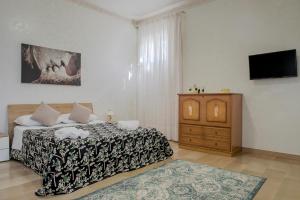 A bed or beds in a room at Casa Caterina