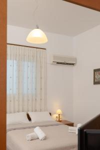 Posteľ alebo postele v izbe v ubytovaní ALBATROS SUITE STEGNA BEACH