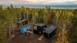 an overhead view of a tiny house in the woods at Ski Hill Cabins and Saunas in Lutsen