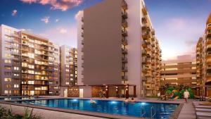 un artista representando un complejo de apartamentos con piscina en Amplio iluminado 2 habitaciones, en Barranquilla