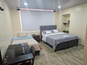 Ένα ή περισσότερα κρεβάτια σε δωμάτιο στο Roma House V- Campin Movistar El Cubo