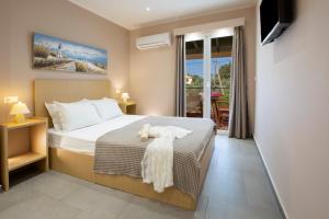 Posteľ alebo postele v izbe v ubytovaní Villa Vita Holidays + 37 fotografií
