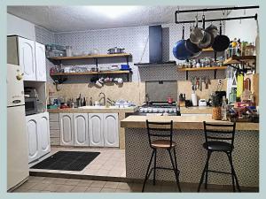 Kuchyň nebo kuchyňský kout v ubytování Casa del Pintor Chetumal