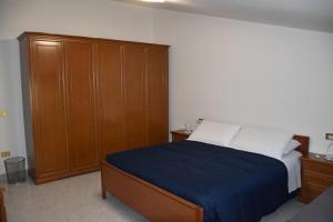Postel nebo postele na pokoji v ubytování Monte Cucco B&B
