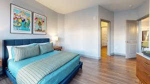 Ένα ή περισσότερα κρεβάτια σε δωμάτιο στο H4N Furnished Apartments at Ellipse Urban in Hampton VA +31 φωτογραφίες