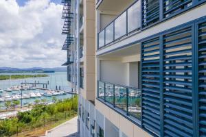 a view of the marina from the balcony of a building at Appartement Corail Bleu in Fort-de-France