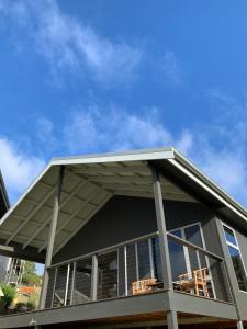 a house with awning on top of it at Sundays in Middleton